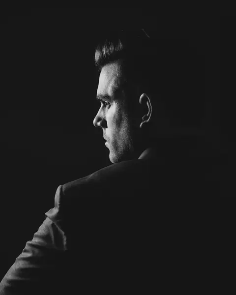 Portrait of Daniel Hollis in profile